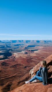 Woman Overlooking Canyon Vista Desert Landscape Mobile Wallpaper