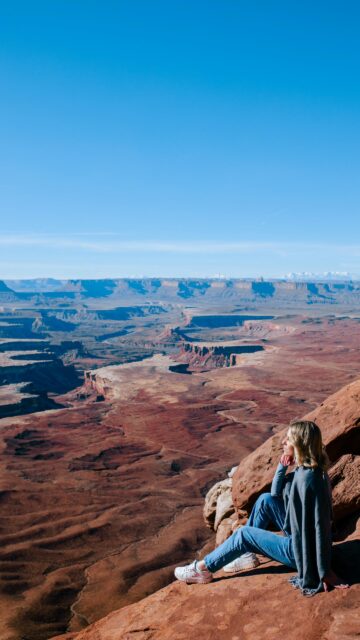 Woman Overlooking Canyon Vista Desert Landscape Mobile Wallpaper