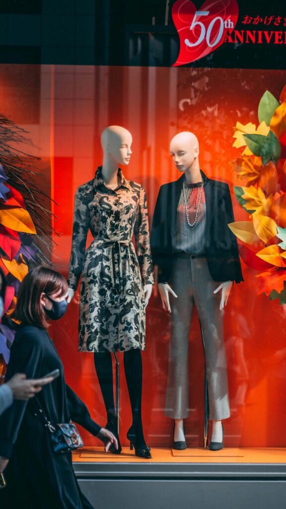 Chic Fashion Store Display with Mannequins 4K Mobile Wallpaper