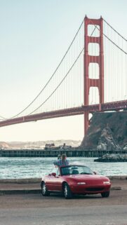 Red Mazda Miata NA at Golden Gate Bridge Mobile Phone Wallpaper