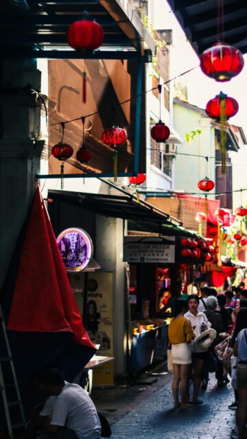 Vibrant Concubine Lane Street Scene with Red Lanterns Mobile Wallpaper