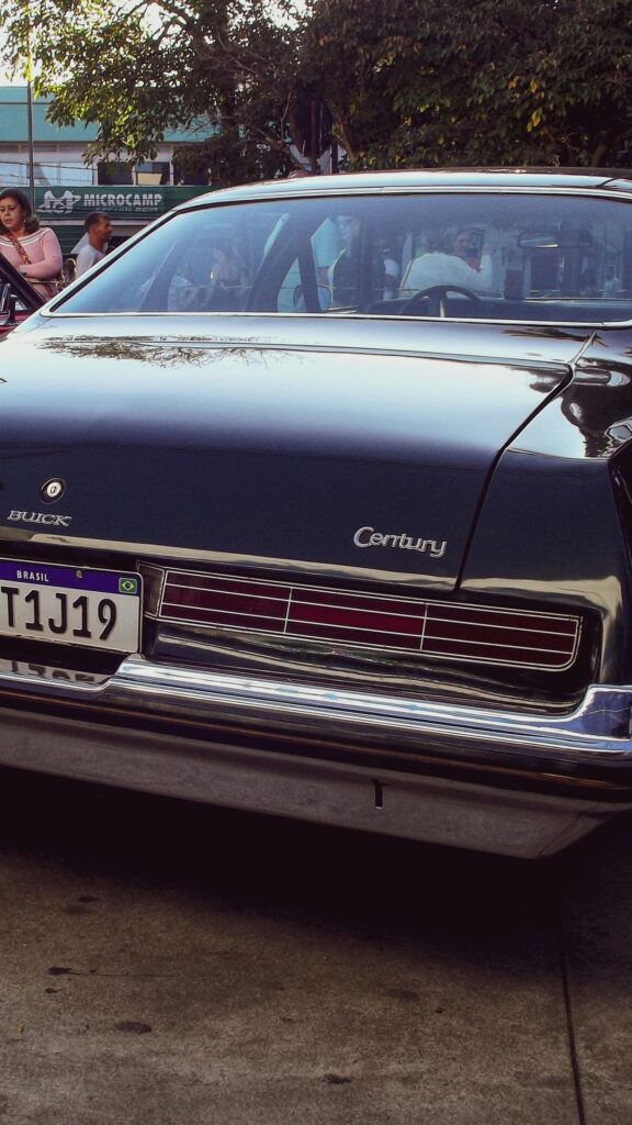 Vintage Buick Century Classic Car Rear View Luxury Aesthetic Wallpaper