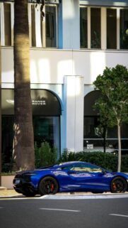 Blue McLaren Artura Supercar Street View Mobile Wallpaper
