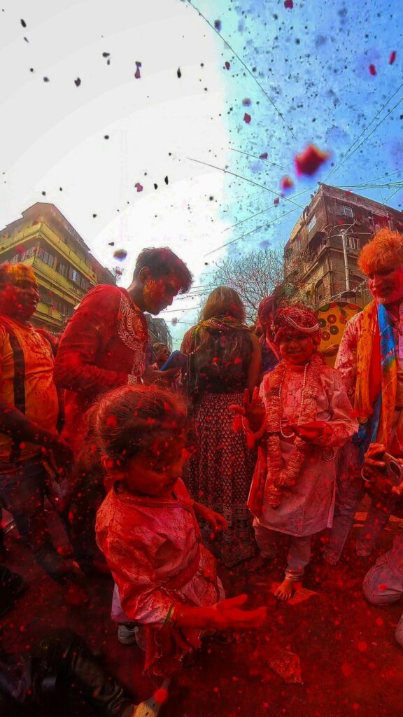Vibrant Holi Festival Celebration Red Color Cloud Mobile Wallpaper