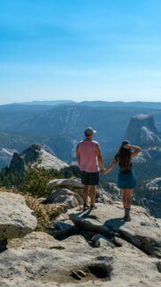 Couple Holding Hands Overlooking Yosemite National Park View Wallpaper