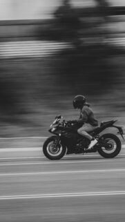 Speeding Yamaha Sportbike Rider in Black and White Mobile Wallpaper