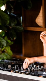 DJ Hands Adjusting Audio Mixer Sound Controller Mobile Wallpaper