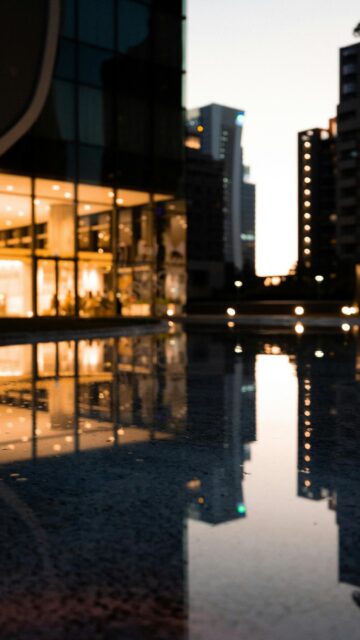 Stunning Night Cityscape Reflection on Water Mobile Wallpaper