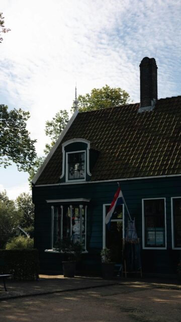 Charming Traditional Dutch Green House Exterior Mobile Wallpaper