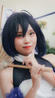 Beautiful Anime Cosplay Girl with Elegant Umbrella Portrait Wallpaper