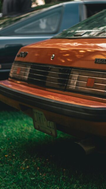 Vintage Mazda RX7 Classic Car Rear View Orange Aesthetic Mobile Wallpaper