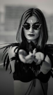 Gothic Raven Queen with Crystal Face Gems and Feather Wings Wallpaper