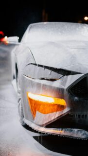 Stunning Ford Mustang Covered in Thick White Car Wash Foam Wallpaper