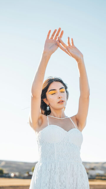 Divine Feminine Energy and Radiant Sun Manifestation Wallpaper