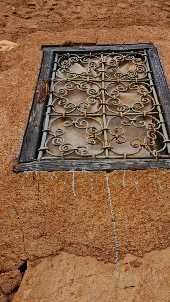 Rustic Wrought Iron Window Frame Texture Close-Up Wallpaper