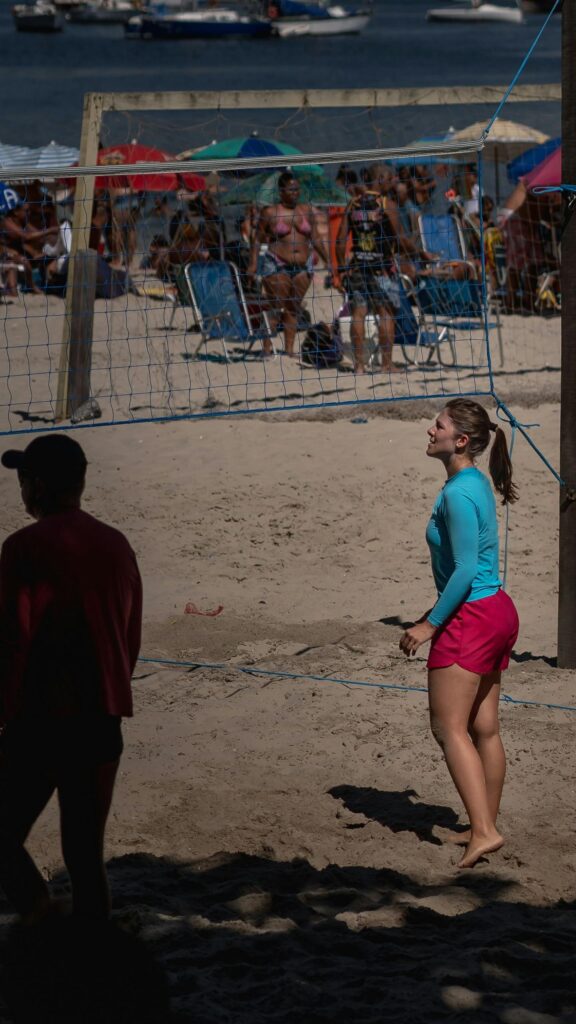 Beach Volleyball Player Focused on the Game Mobile Wallpaper