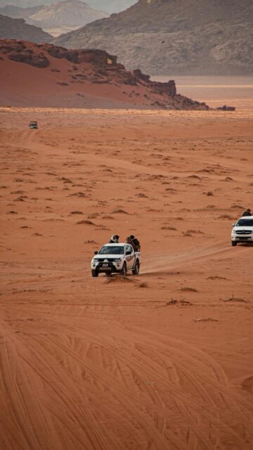 Off-Road Desert Adventure in Wadi Rum Mobile Wallpaper