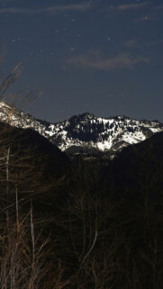 Celestial Night Sky over Snowy Mountains Aesthetic Spiritual Wallpaper