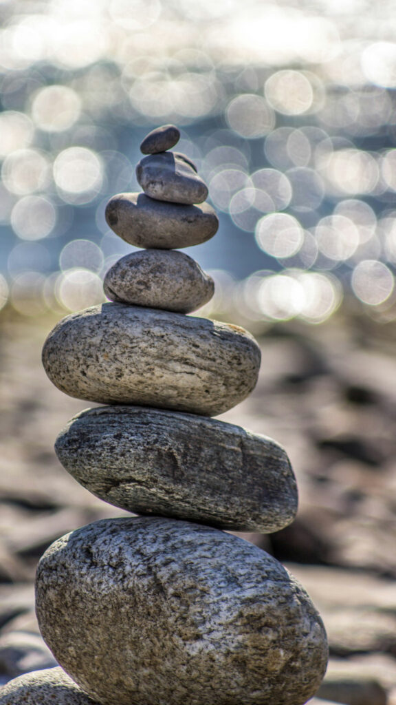 Zen Stone Stacking for Grounding and Root Chakra Alignment Wallpaper