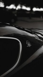 Luxury Maserati Trident Emblem Minimalist Black Car Wallpaper