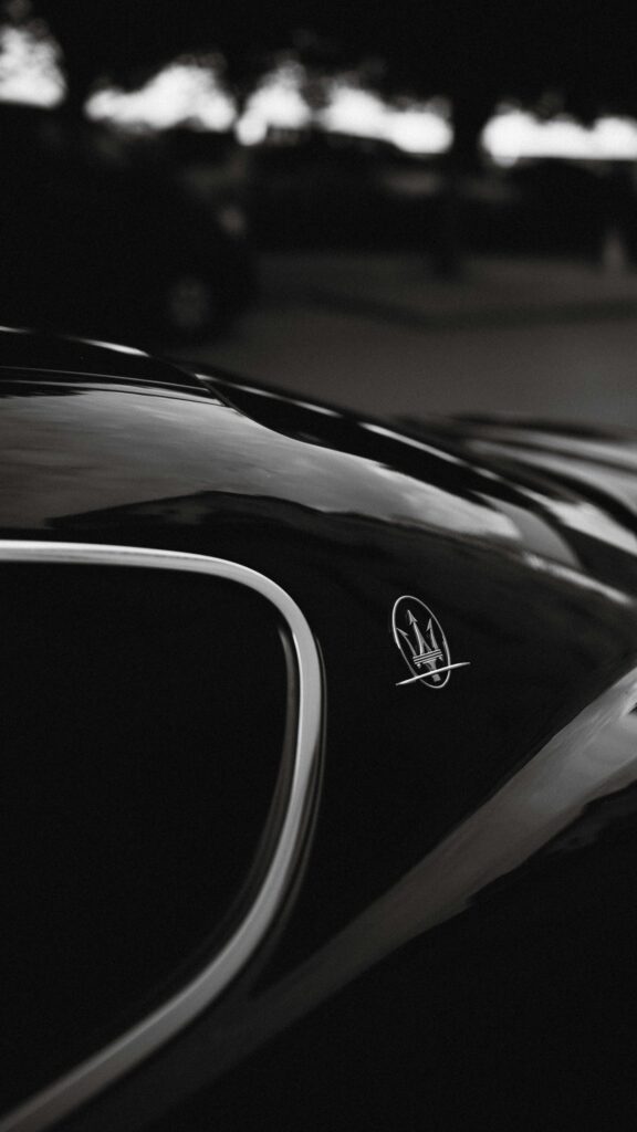 Luxury Maserati Trident Emblem Minimalist Black Car Wallpaper