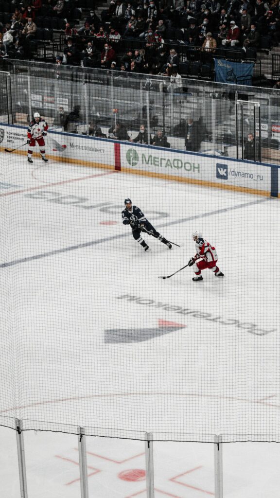 Professional Ice Hockey Game Action Shot Mobile Wallpaper
