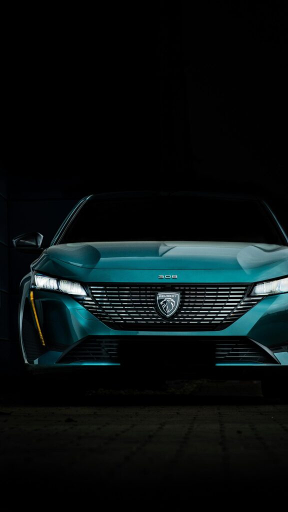 Peugeot 308 Emerald Green Sporty Front View Mobile Wallpaper
