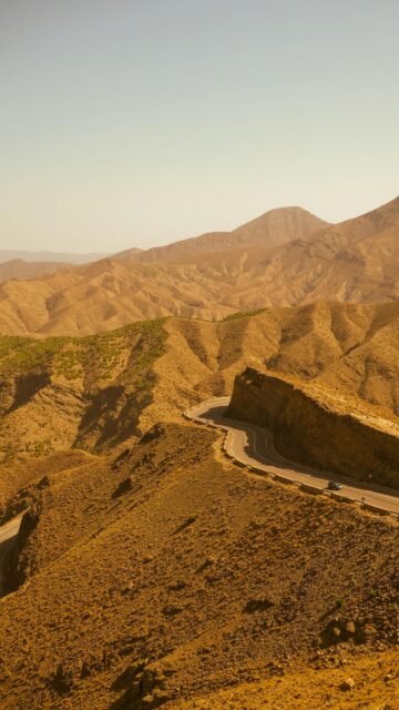 Winding Desert Mountain Road Scenic View Mobile Wallpaper
