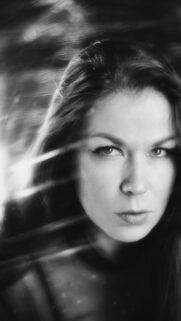 Stunning Black and White Portrait of a Mysterious Woman Mobile Wallpaper
