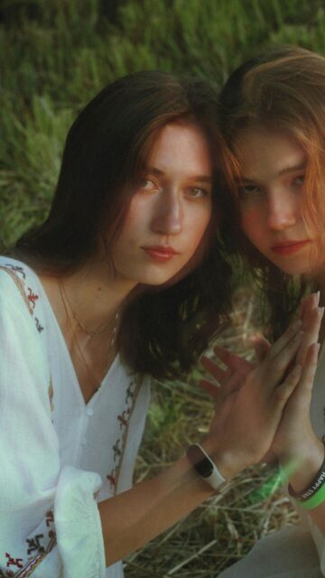 Dreamy Portrait of Two Young Women in Nature Aesthetic Mobile Wallpaper