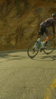 Cyclist Cycling on Mountain Road Sport Mobile Wallpaper