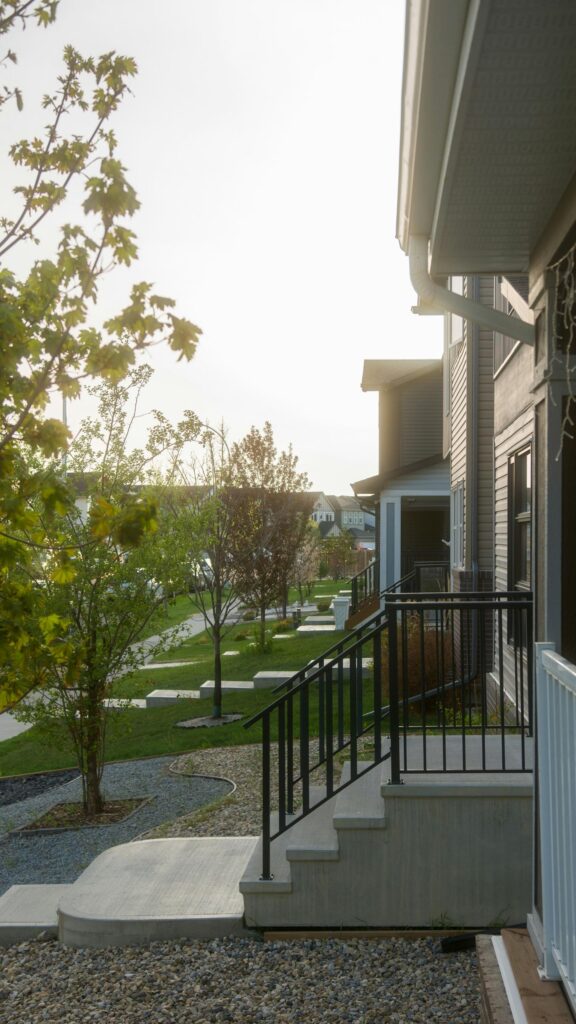 Sunlit Suburban Neighborhood Architectural View Phone Wallpaper