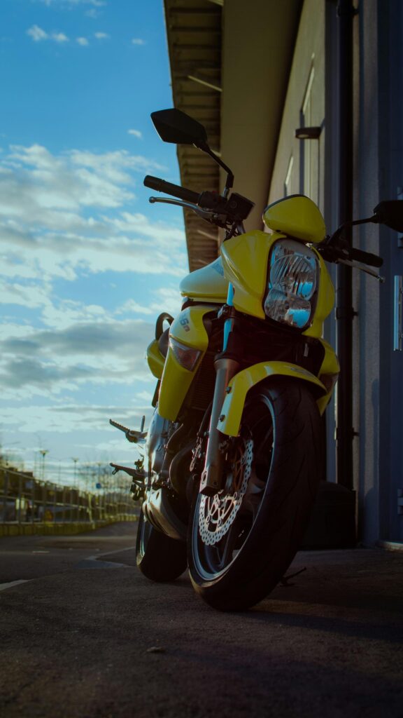 Stunning Yellow Sports Motorcycle Low Angle Sunset Mobile Wallpaper