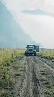Rugged Off-Road Toyota Land Cruiser in Misty Bromo Mountains Wallpaper