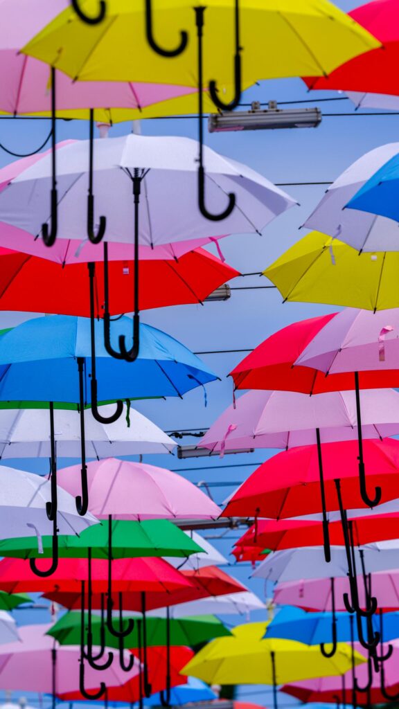 Vibrant Colorful Floating Umbrellas Art Mobile Phone Wallpaper