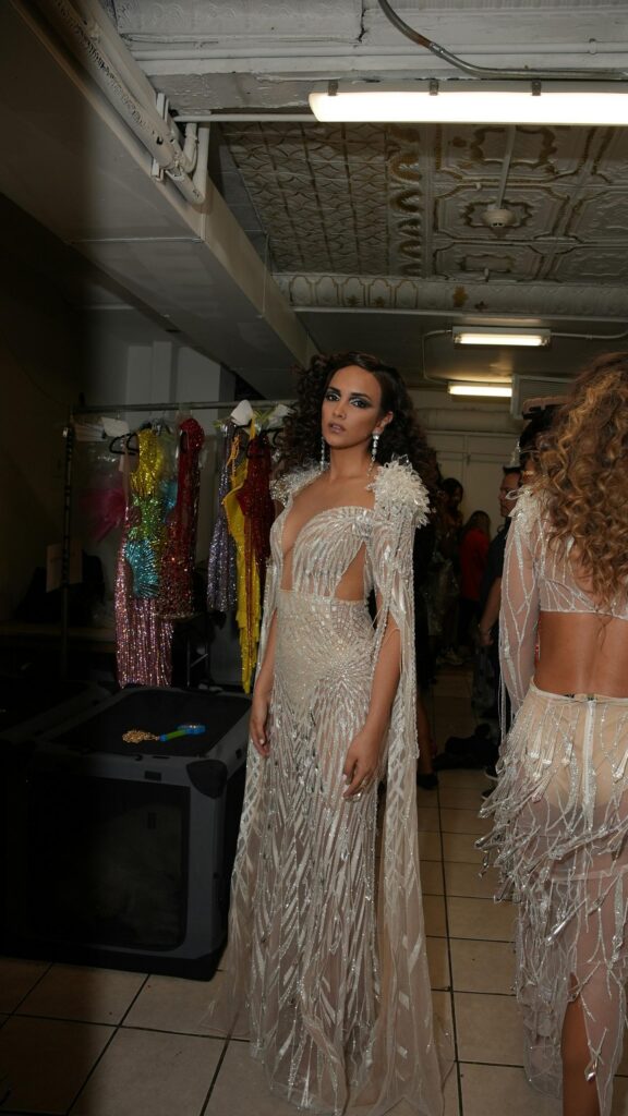 Stunning Fashion Model in Glittering Beaded Gown High-Res Wallpaper