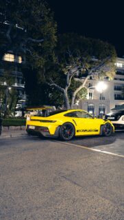 Yellow Porsche 911 GT3 RS Night City Street Luxury Sports Car Wallpaper