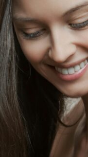 Beautiful Woman Smiling Close Up Aesthetic Phone Wallpaper