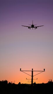 Stunning Airplane Sunset Landing Silhouette Mobile Wallpaper