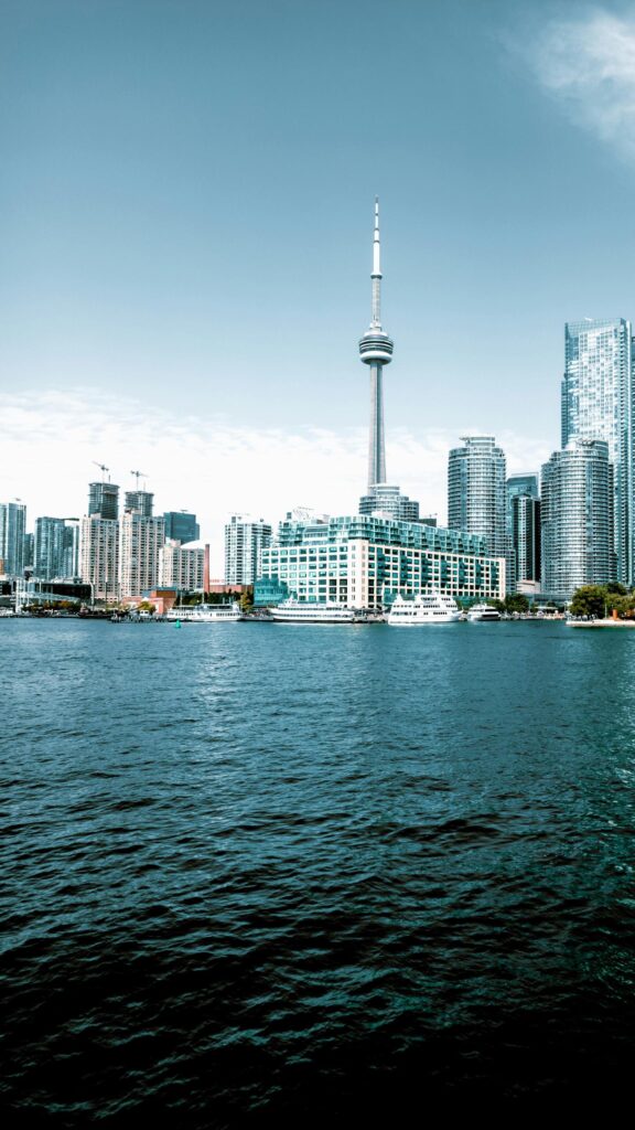 Stunning Toronto Skyline and CN Tower over Lake Ontario Mobile Wallpaper