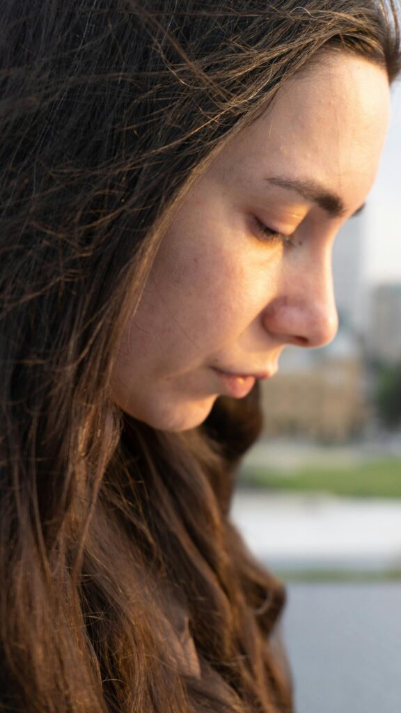 Profile Portrait of Young Woman at Sunset Golden Hour Mobile Wallpaper