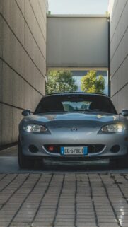 Silver Mazda Miata NB Sports Car Parked Between Walls Wallpaper