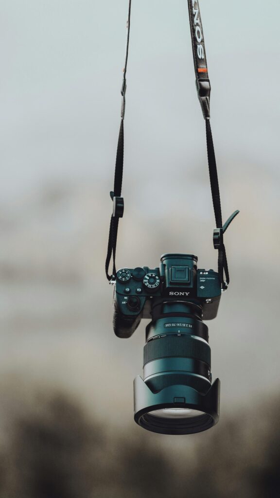 Sony Alpha Camera Hanging Professional Photography Mobile Wallpaper