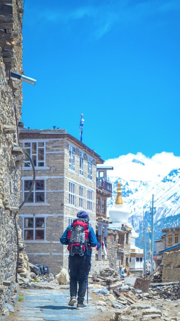 Himalayan Mountain Trekker in Ancient Stone Village Phone Wallpaper
