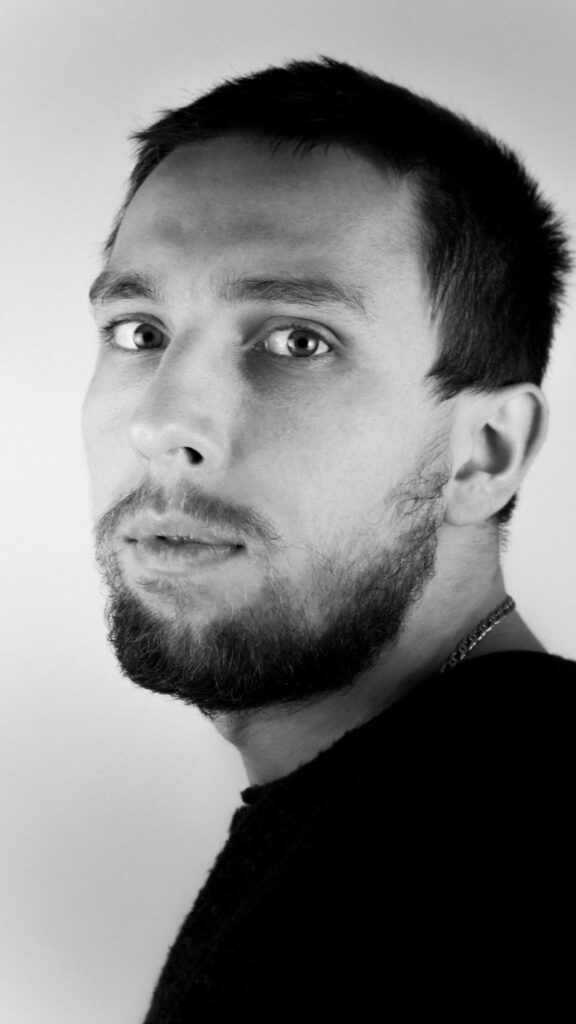 Black and White Portrait of a Bearded Man Mobile Wallpaper