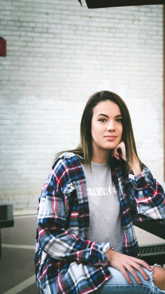 Beautiful Young Woman Wearing Plaid Flannel Shirt Mobile Wallpaper