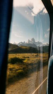 View of Mount Fitz Roy from a Bus Window Travel Wallpaper