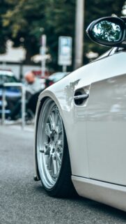 White BMW M3 Stanced Sports Car Close-up Premium Mobile Wallpaper