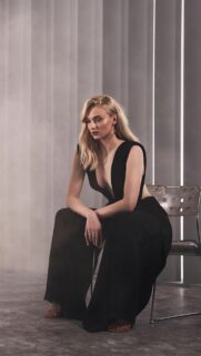 Stunning Sophie Turner Portrait in Elegant Black Jumpsuit Mobile Wallpaper