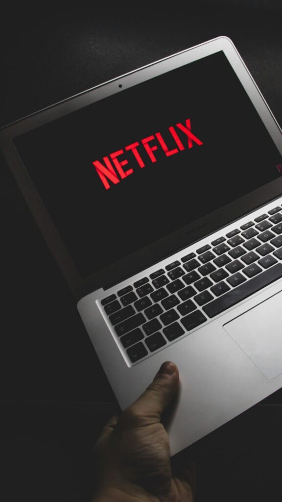 The composition in Cinematic Netflix Laptop Branding Mobile Wallpaper feels precise without looking rigid. A small visual reset for a busy screen.